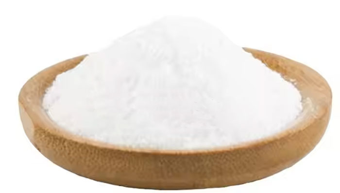 White cyanuric acid powder in a wooden plate