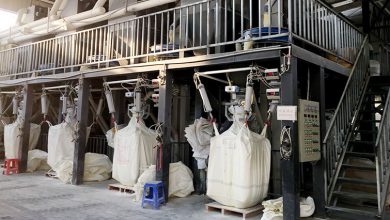 Industrial production line for dry powder fire extinguishing agents, featuring ploughshare mixing and automatic bag filling systems