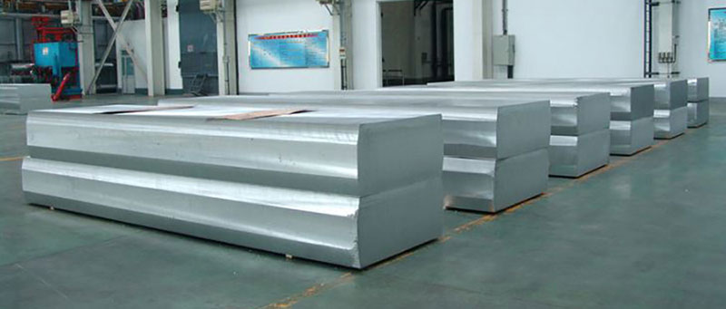 A row of aluminum ingots that have been sawed and are ready for further processing or use in manufacturing