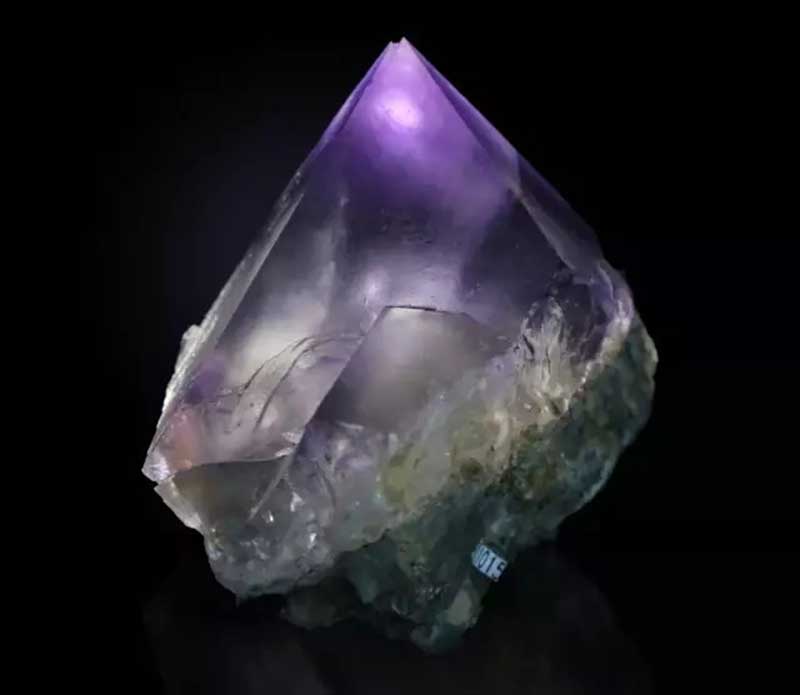 mineral crystal showcasing sharp geometric growth, resembling the perfect magnified form of natural crystal structures