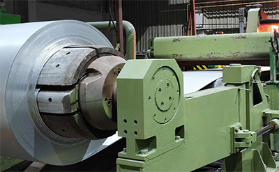 Metal coil uncoiler for strip processing