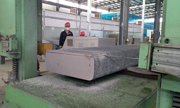 horizontal high speed band saw is cutting a aluminum ingot