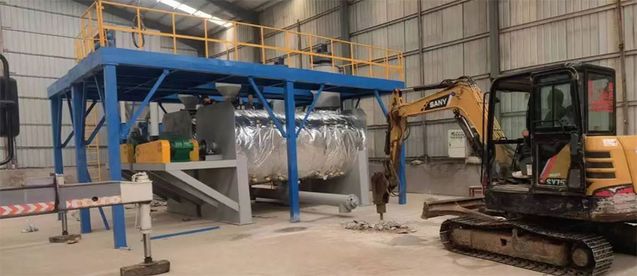 Operational ploughshare mixer in a dry powder fire extinguishing agent production plant, featuring heating insulation, feeding platform, and integrated control system.