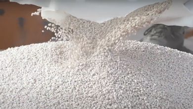 pouring Ammonium Chloride granules from the bag